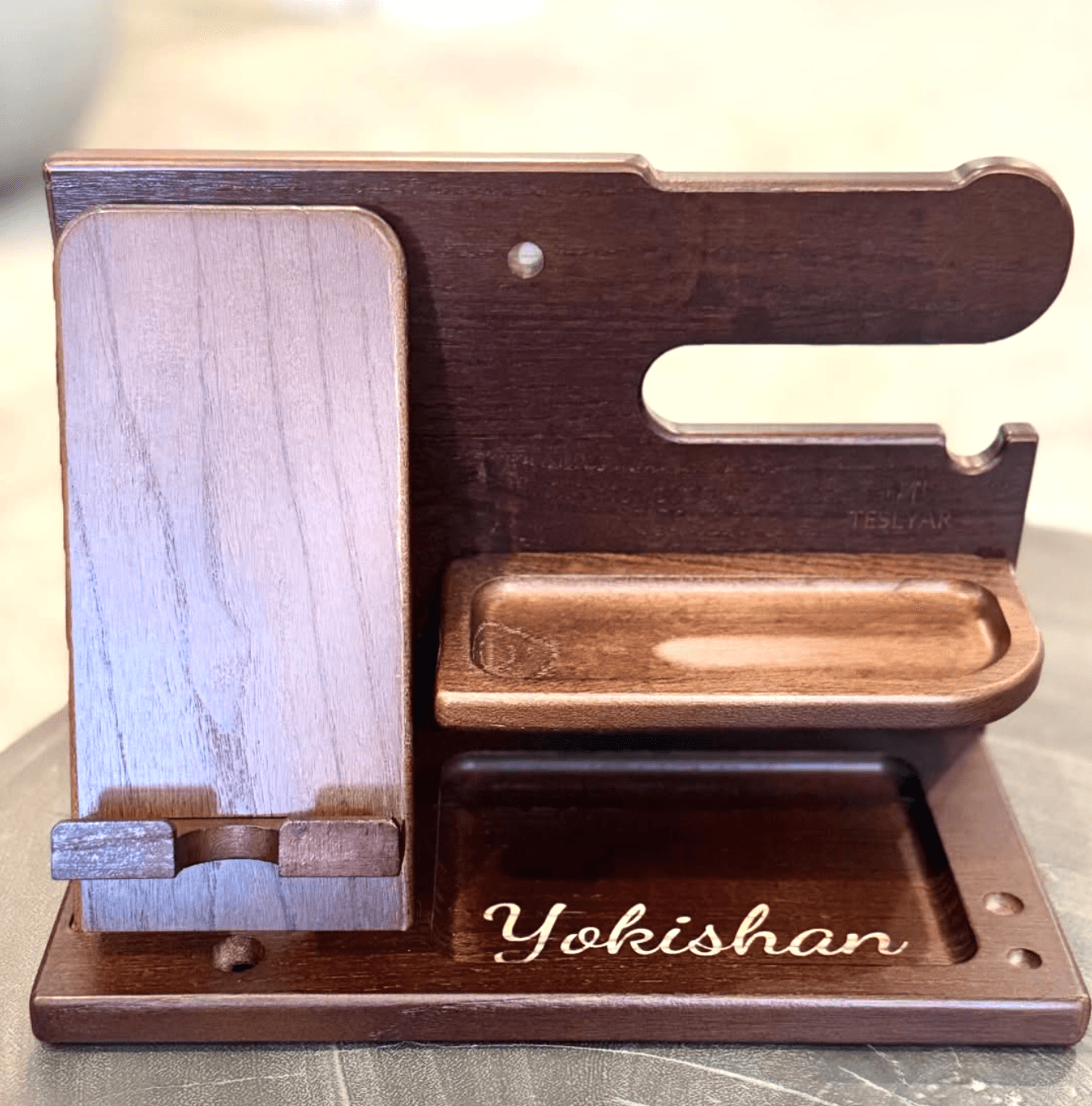 Engraved wooden phone dock